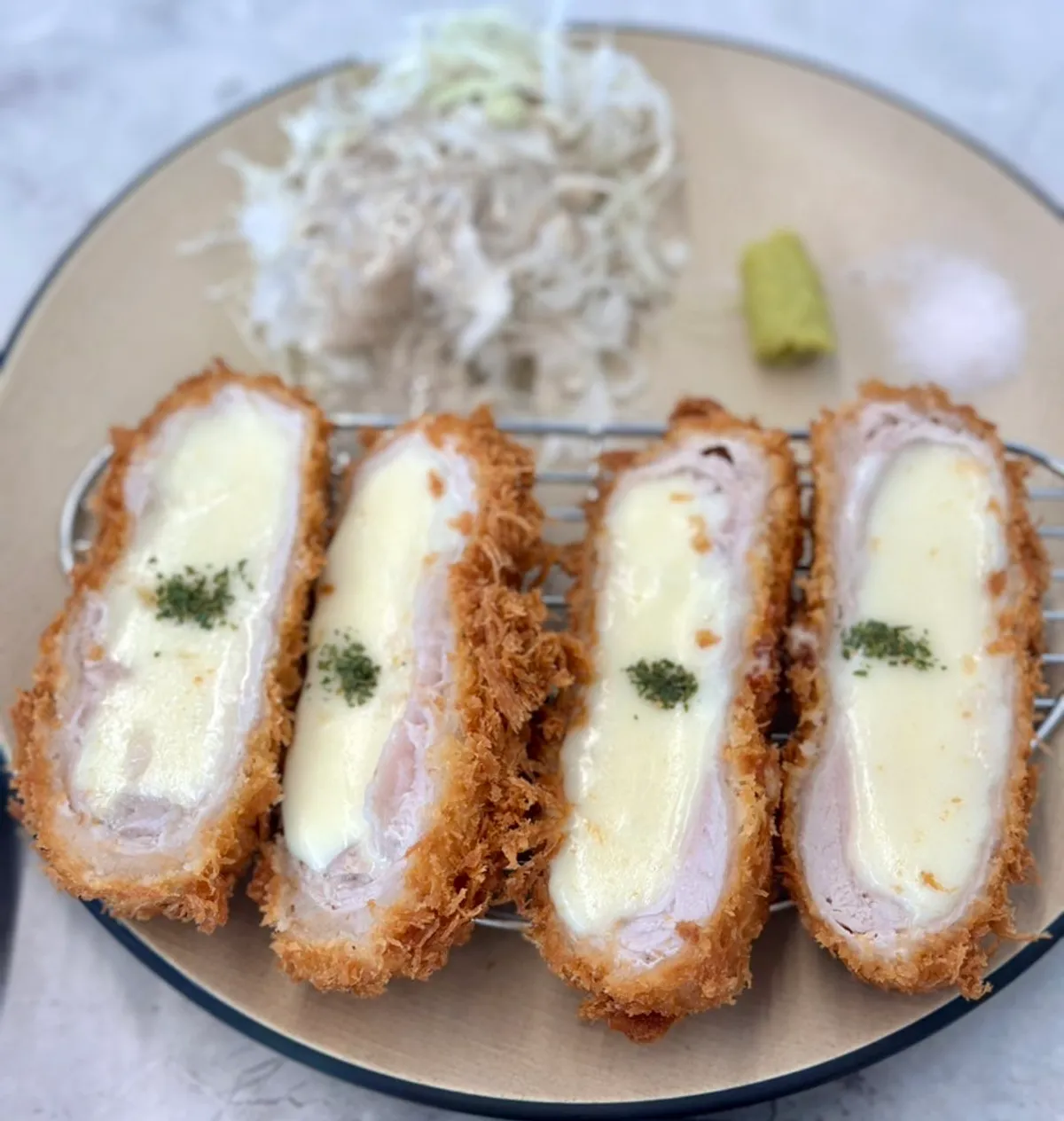 A plate of cheese katsu at Omi Katsu