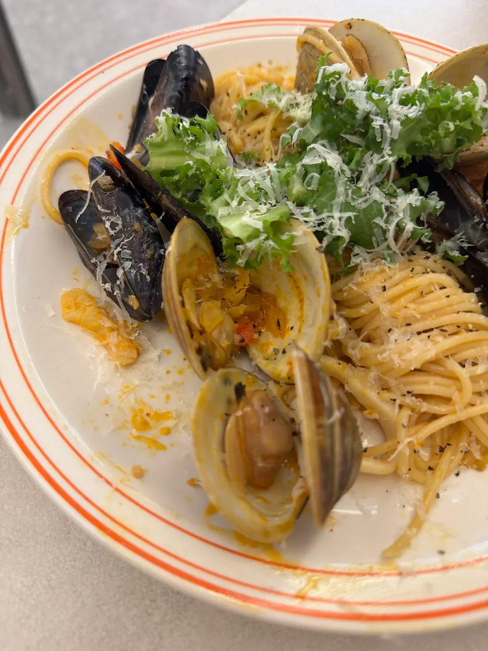 Spicy seafood pasta topped with mussels and clams