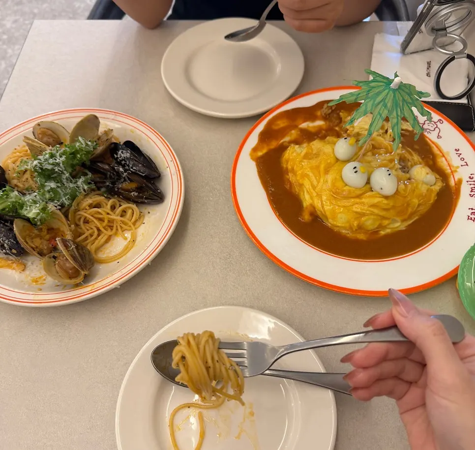 Spicy seafood pasta noodles twirled around a fork