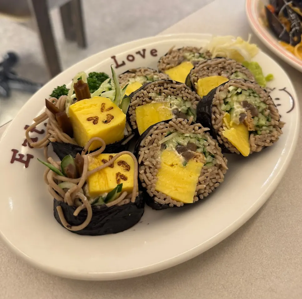 A plate of Omil's soba maki made with buckwheat noodles
