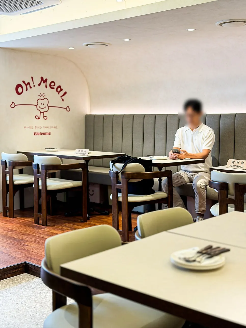 Interior of Omil with wall art and decorative pieces
