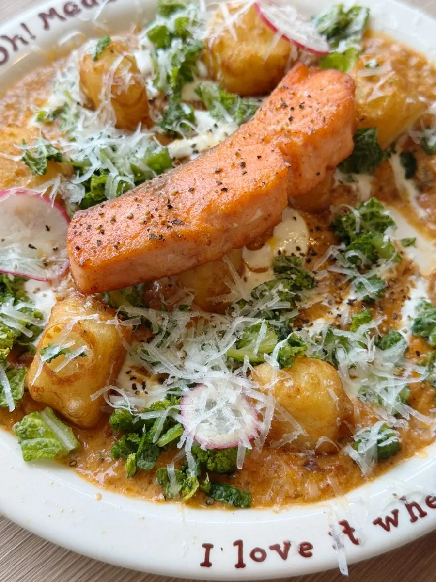 Thick salmon steak with potato gnocchi