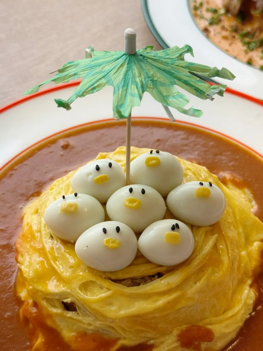 Omurice topped with quail-egg ducklings