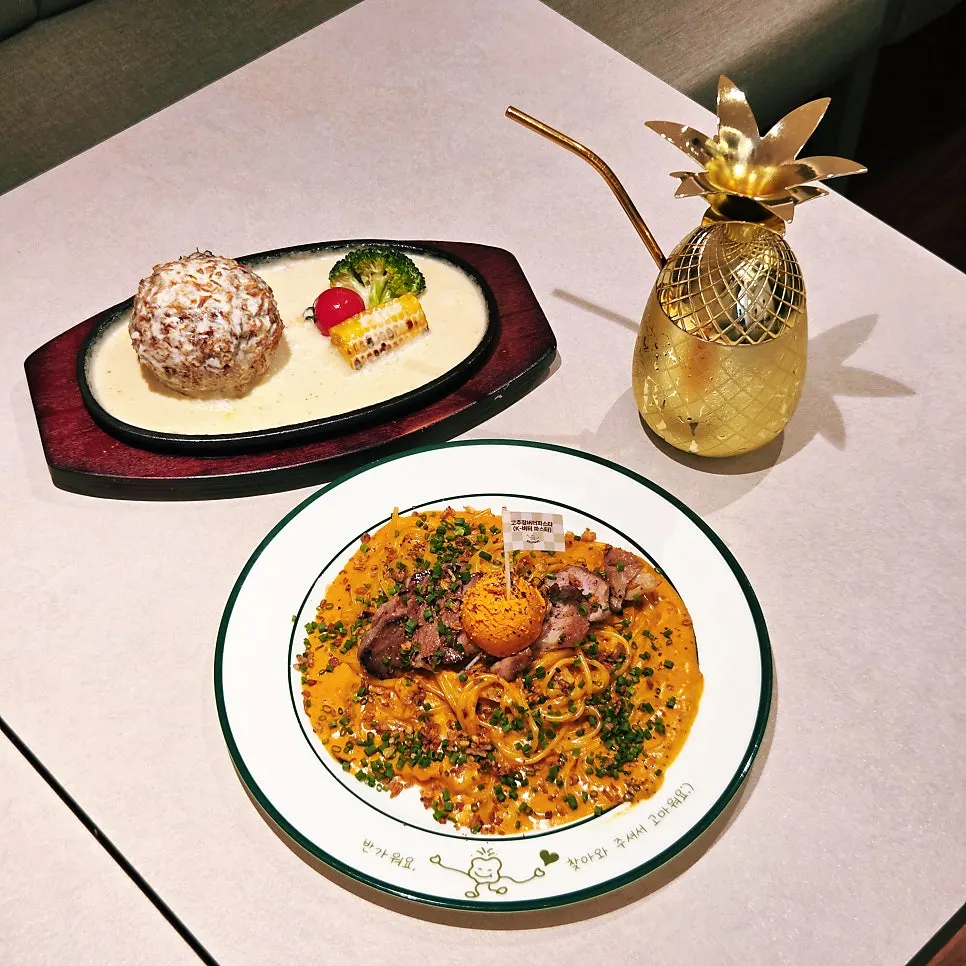 A full table spread of pasta and cheese katsu