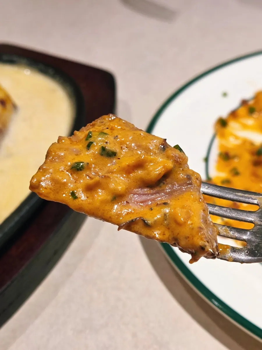 Noodles coated in the thick K-butter sauce