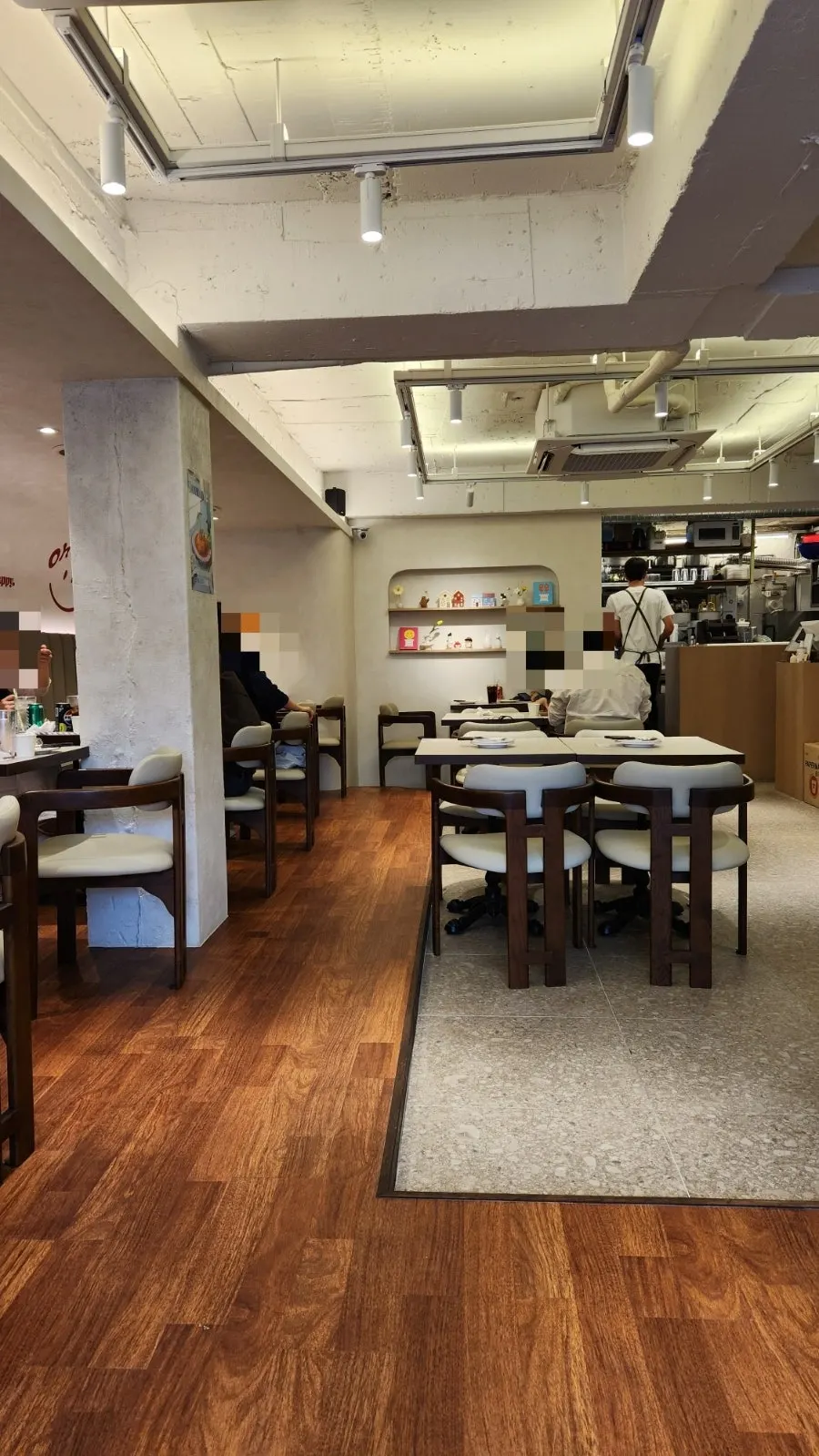 Wood-tone interior of Omil Hyehwa Daehangno