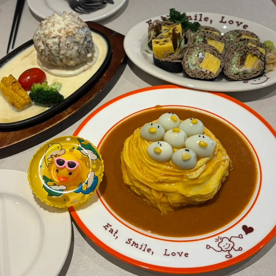 A full spread of Omil's three dishes