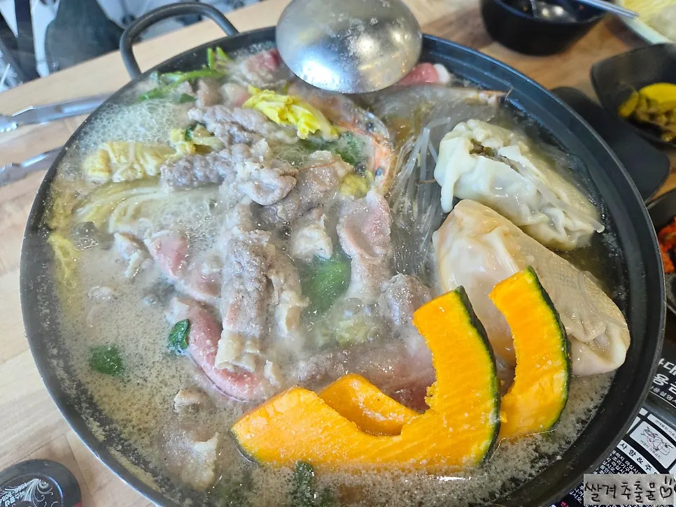 The dumpling hot pot bubbling on the burner