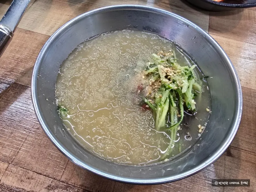 Complimentary mini cold noodle soup served after the meal
