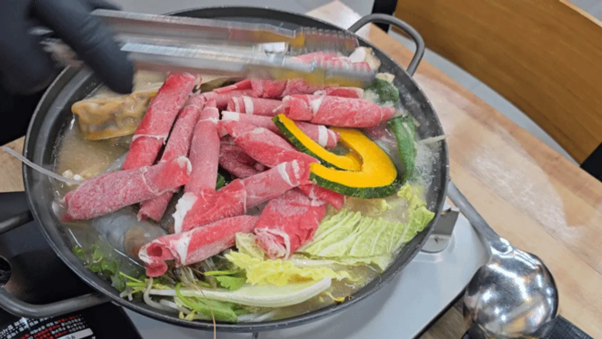 Finished spread of Omi Omi's handmade dumpling hot pot meal