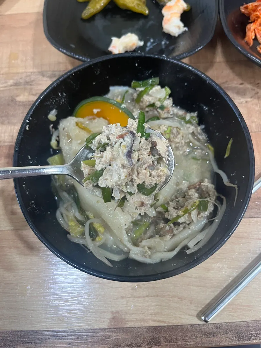 Handmade dumplings added last to cook in the hot pot