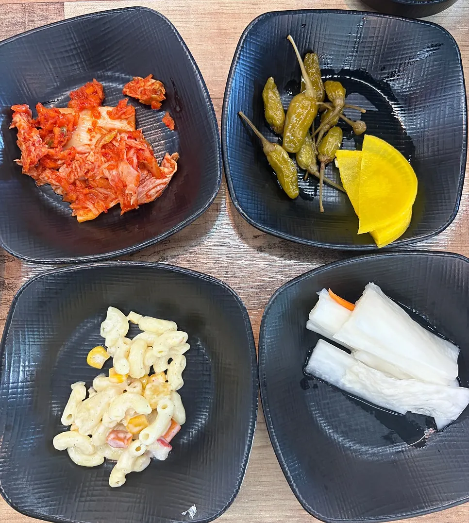 Side dishes served with the dumpling hot pot