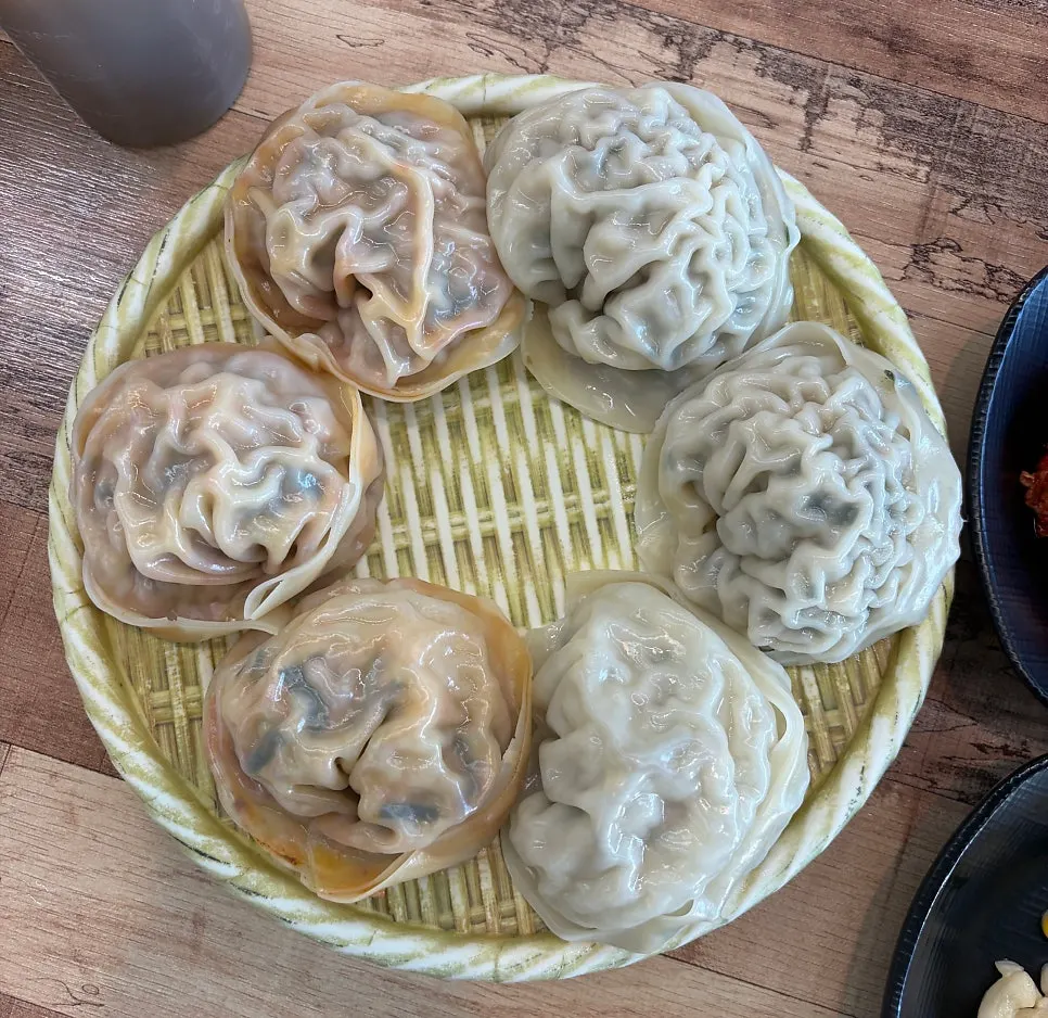 Steamed jumbo mandu served first