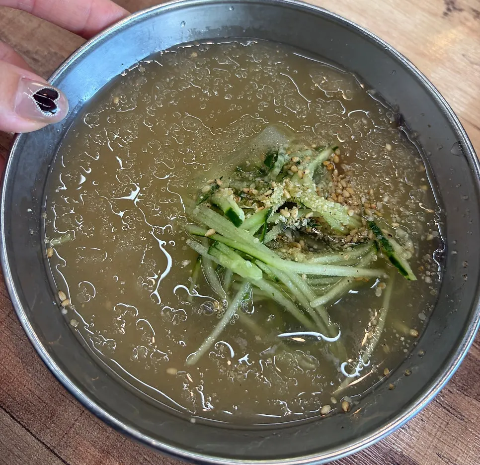 Bowl of water naengmyeon served as dessert