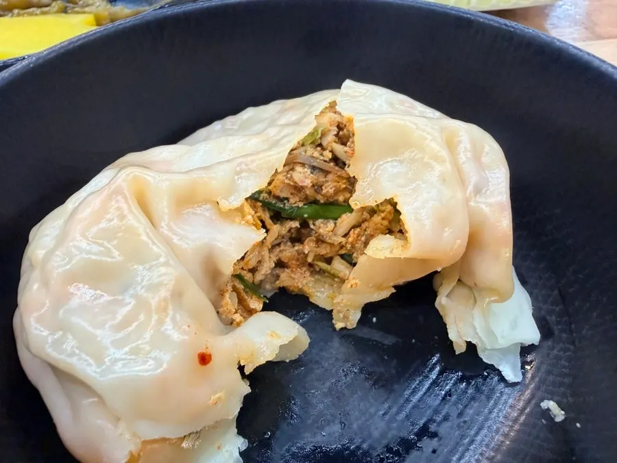 A plate of appetizer steamed dumplings