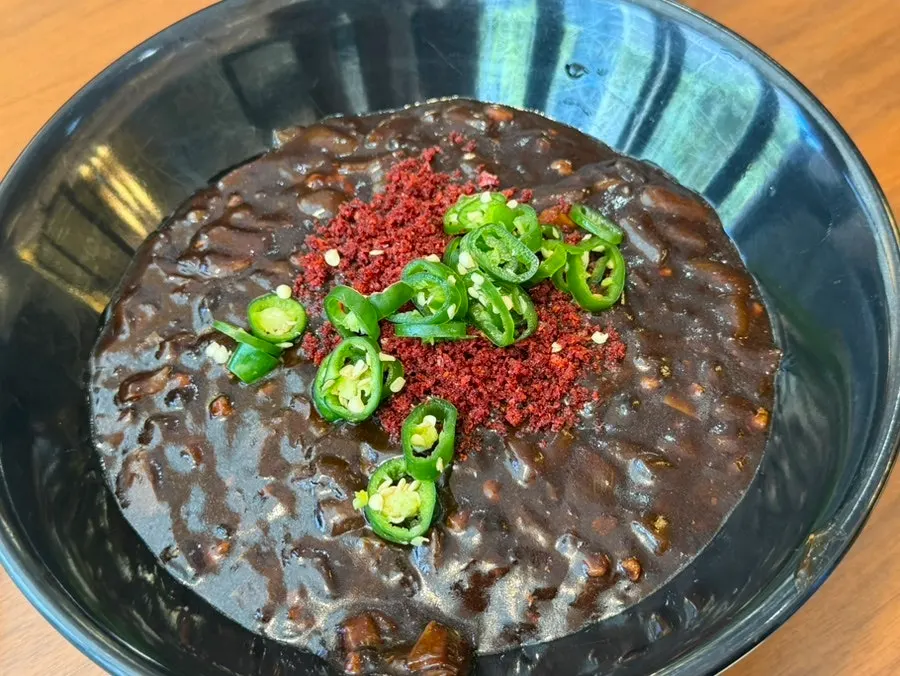Cross-section of mini tangsuyuk showing the thin batter