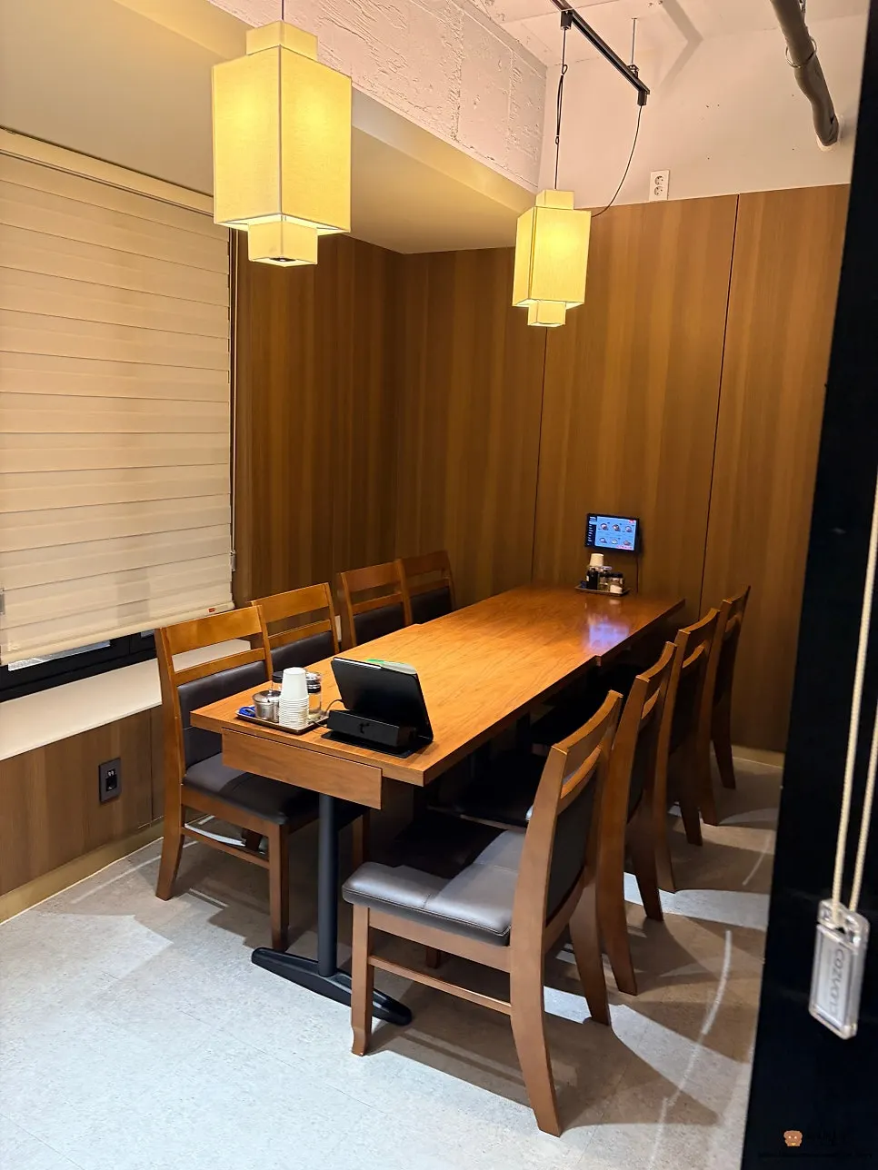 Spacious seating area with group tables at Yugwanjang Banjeom