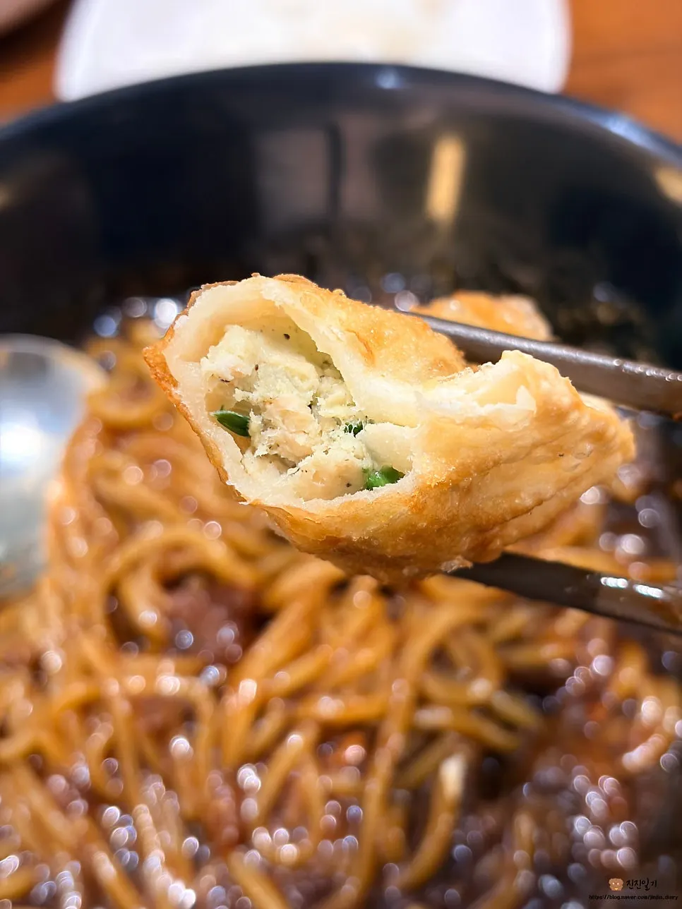 Cross-section of fried dumplings on a plate