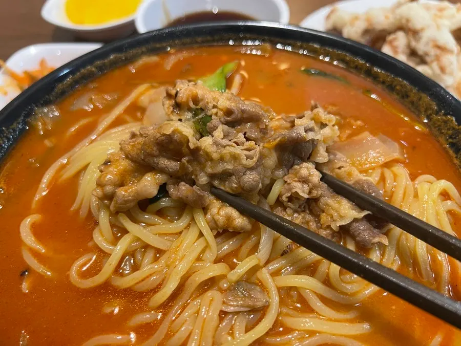 Heavy bone-broth broth with seafood toppings