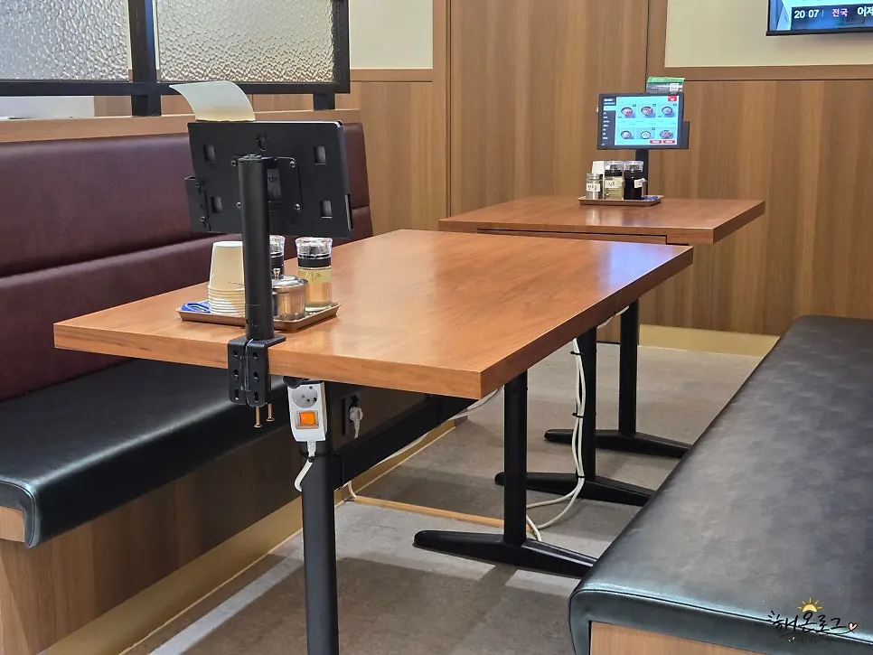 View of the dining hall with roomy tables