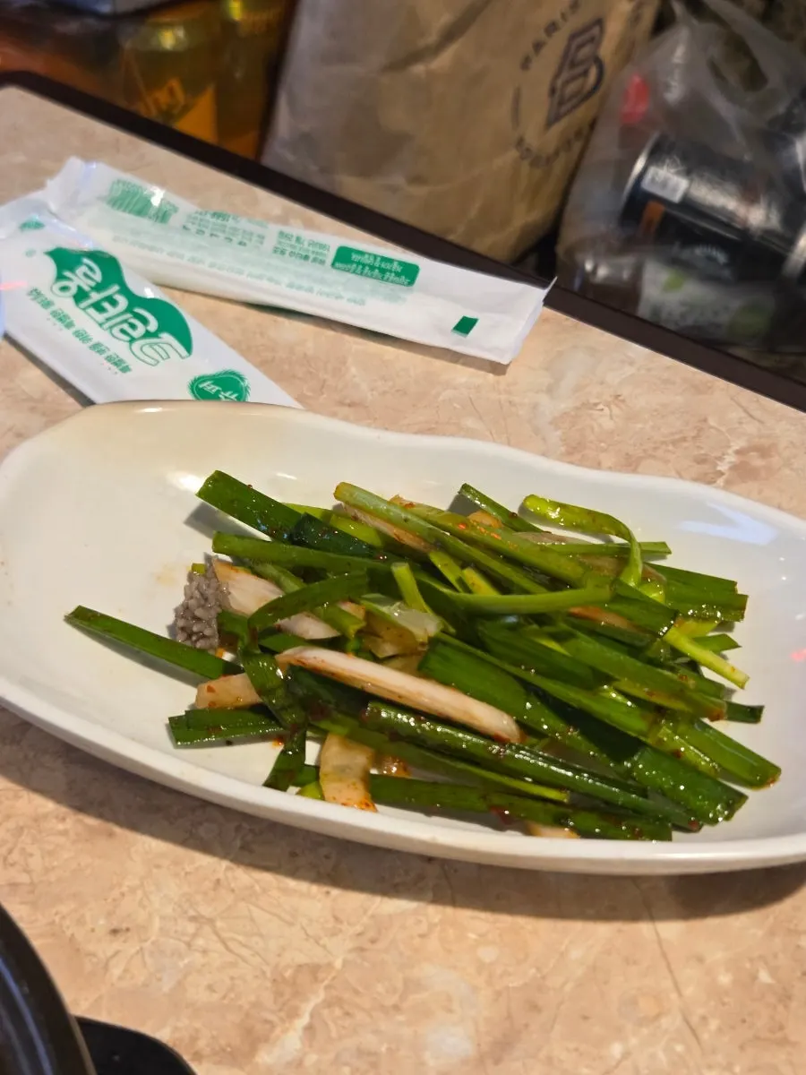 Table setting of side dishes to enjoy with gopchang