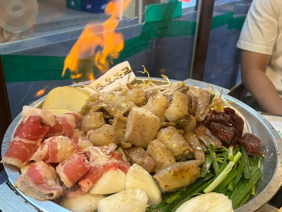 Daechang and makchang cooking on the grill