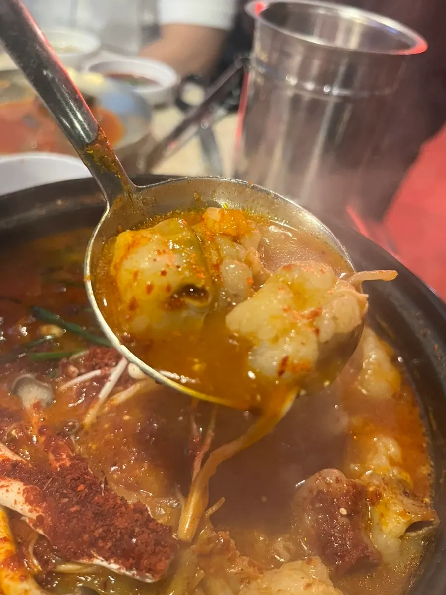 Spicy broth of the gopchang hot pot simmering