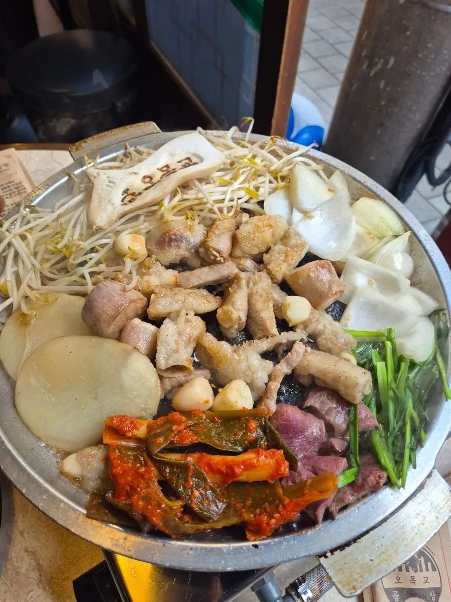 Free spicy sundubu-jjigae served with the meal