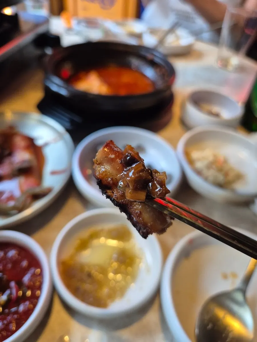 Well-cooked gopchang with green onion kimchi