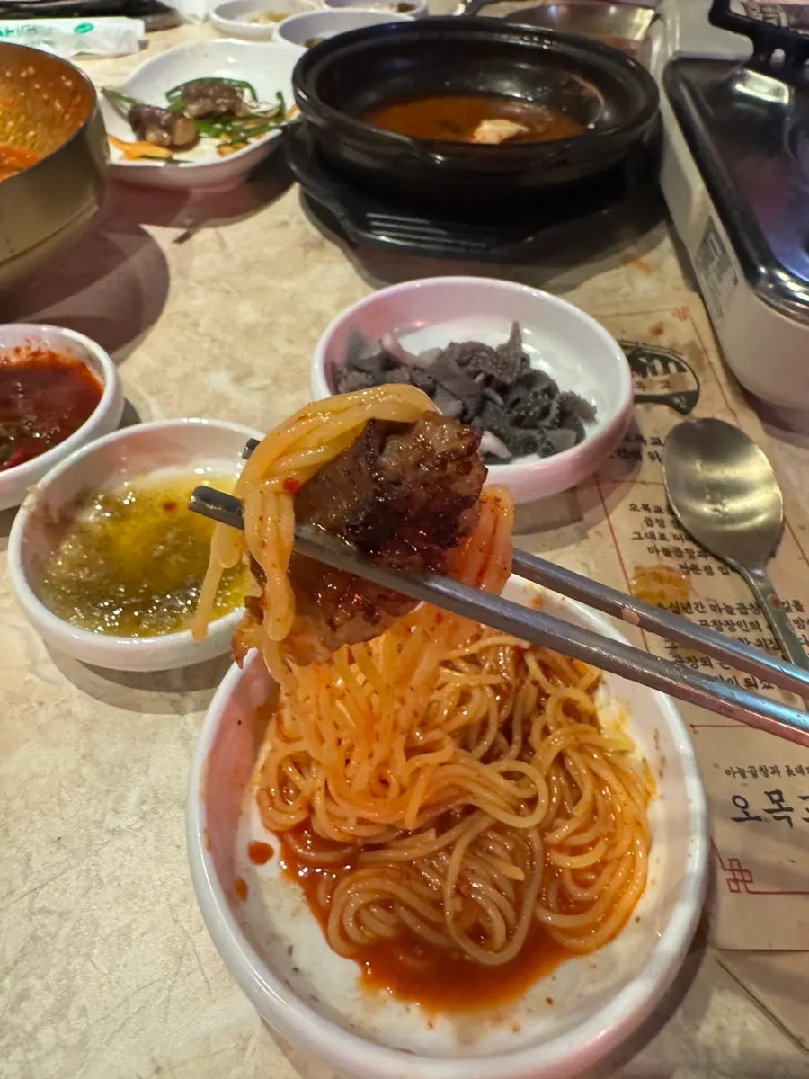 Sweet and spicy bibim guksu ordered alongside the gopchang