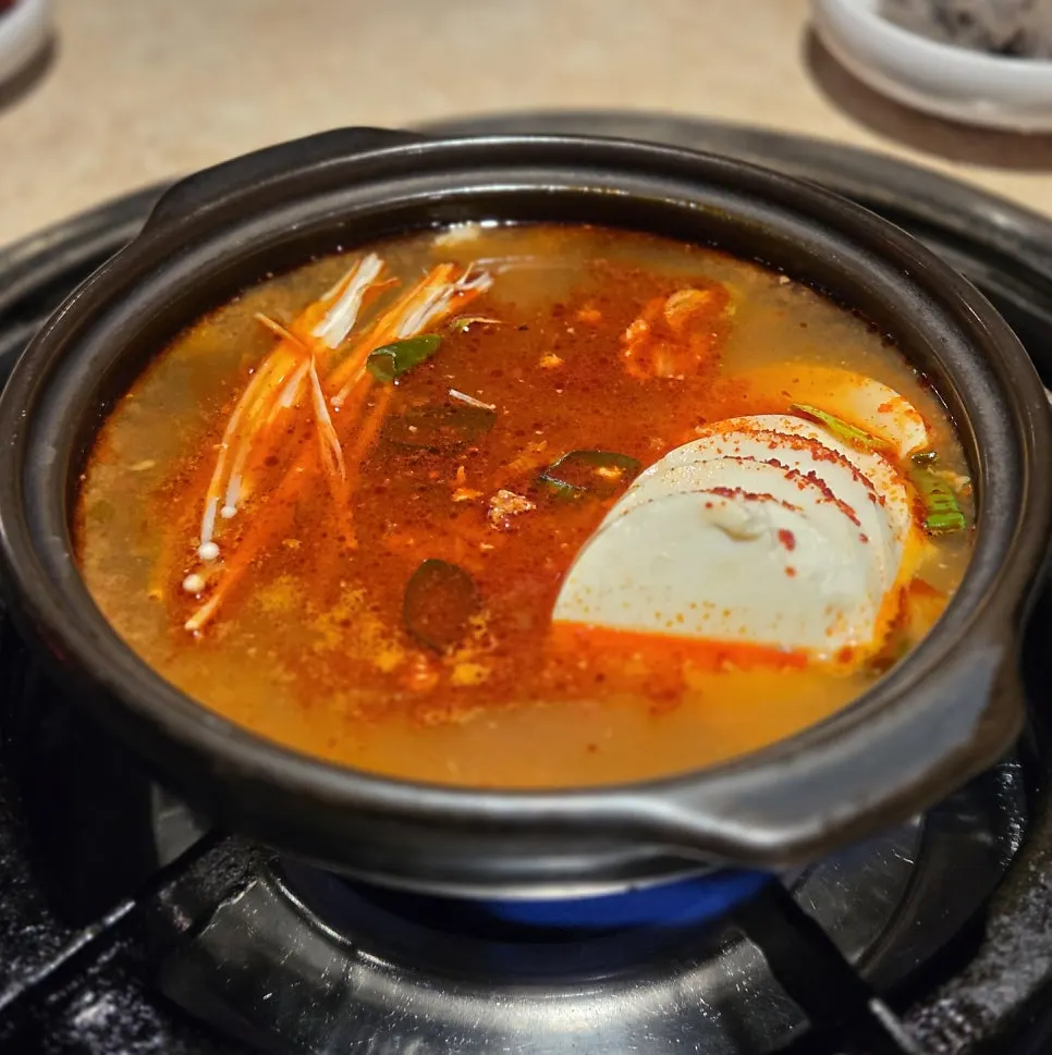 A bowl of spicy sundubu-jjigae
