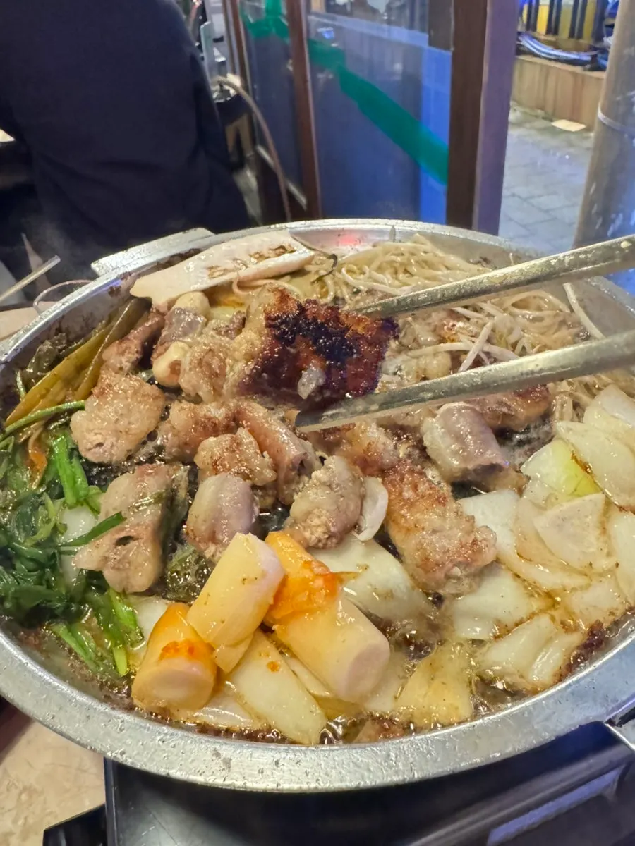 Cross-section of garlic gopchang packed with gop