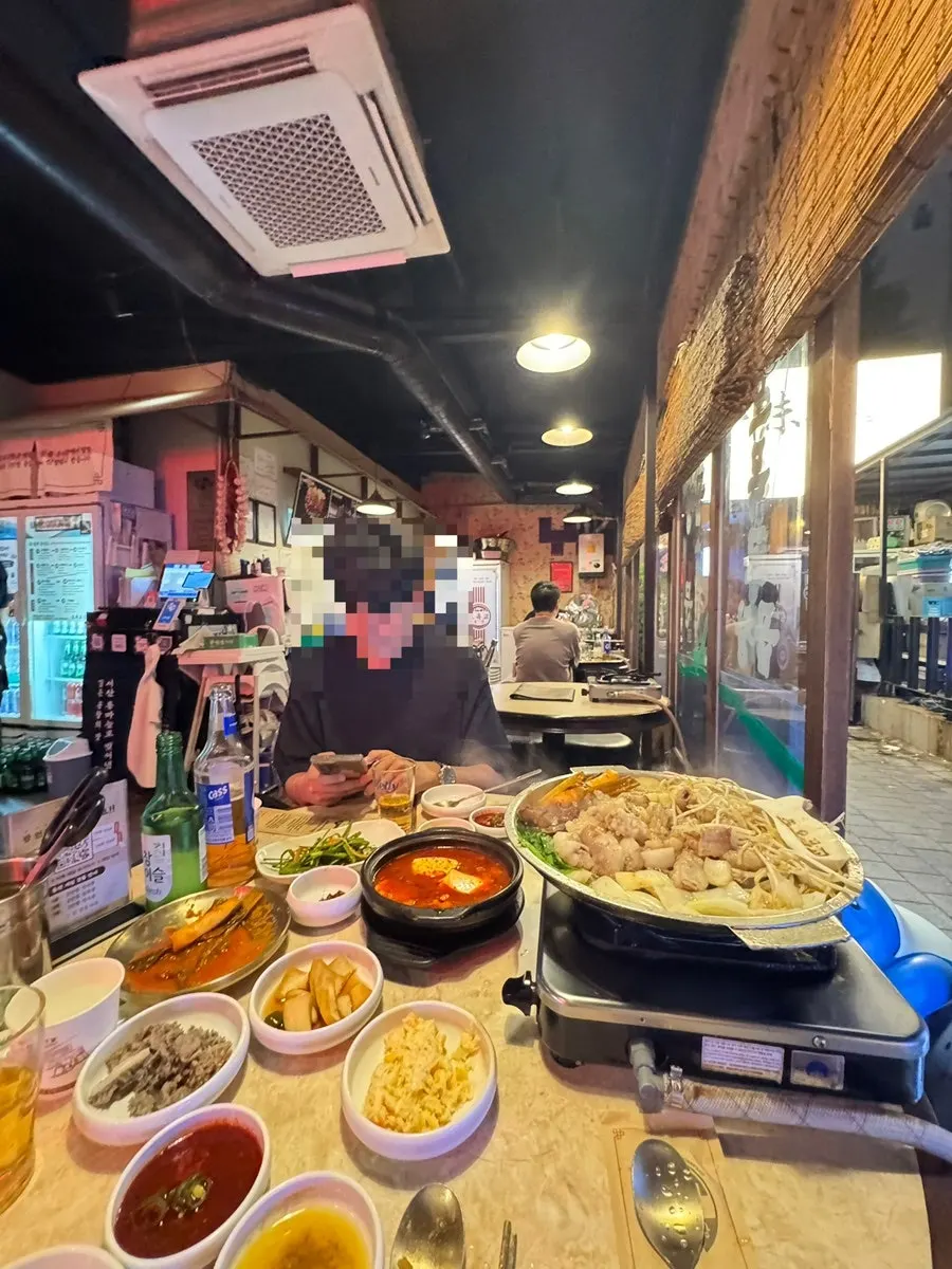 Omokgyo Gopchang storefront with a broadcast feature notice
