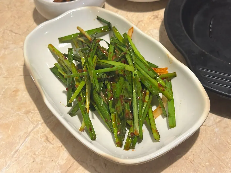 Gochujang sauce, sesame oil sauce, and scallion kimchi