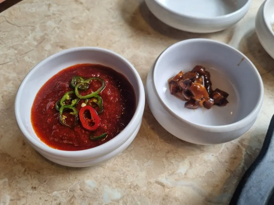 Side dishes and sauces set on the table