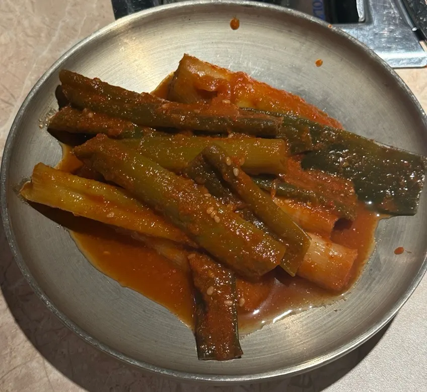 Chive salad tossed in special chili sauce