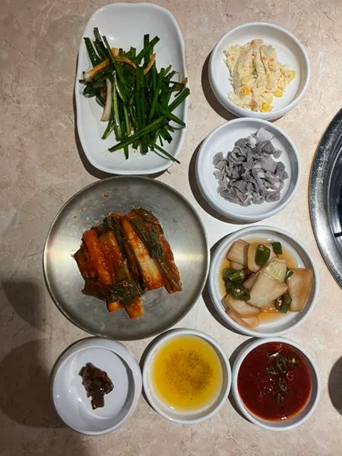 Bubbling sundubu-jjigae served as a standard side