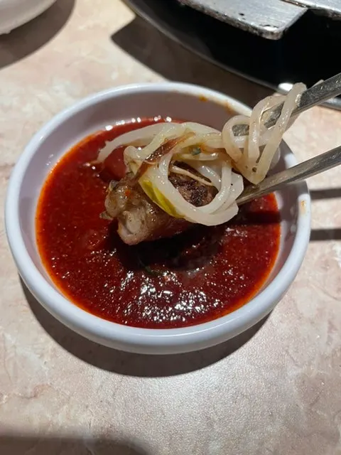 Gopchang paired with the spicy house sauce