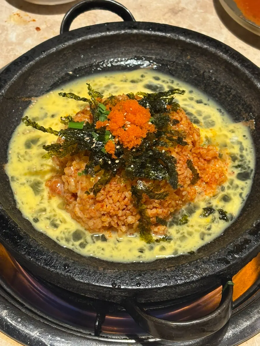 Gopchang and side vegetables on the grill
