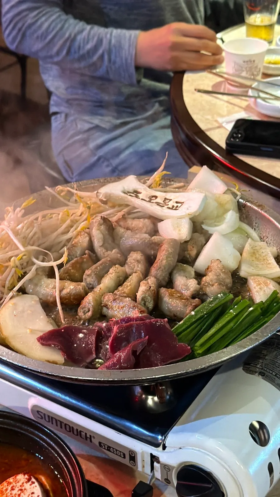 Fire show scene with two servings of regular beef gopchang