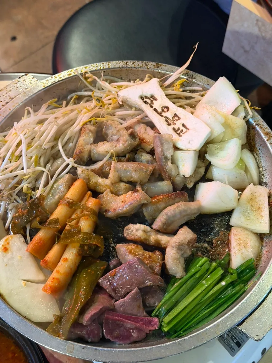 Two servings of beef gopchang on the grill