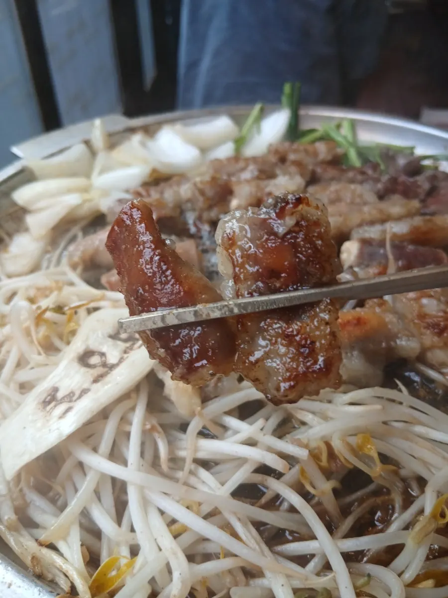 Crispy fried potato with a piece of gopchang