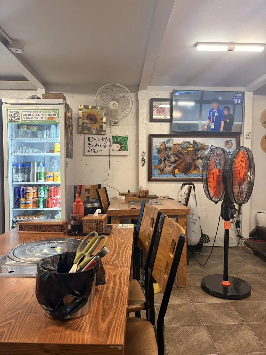 Old-school restaurant interior with origin-labeling board