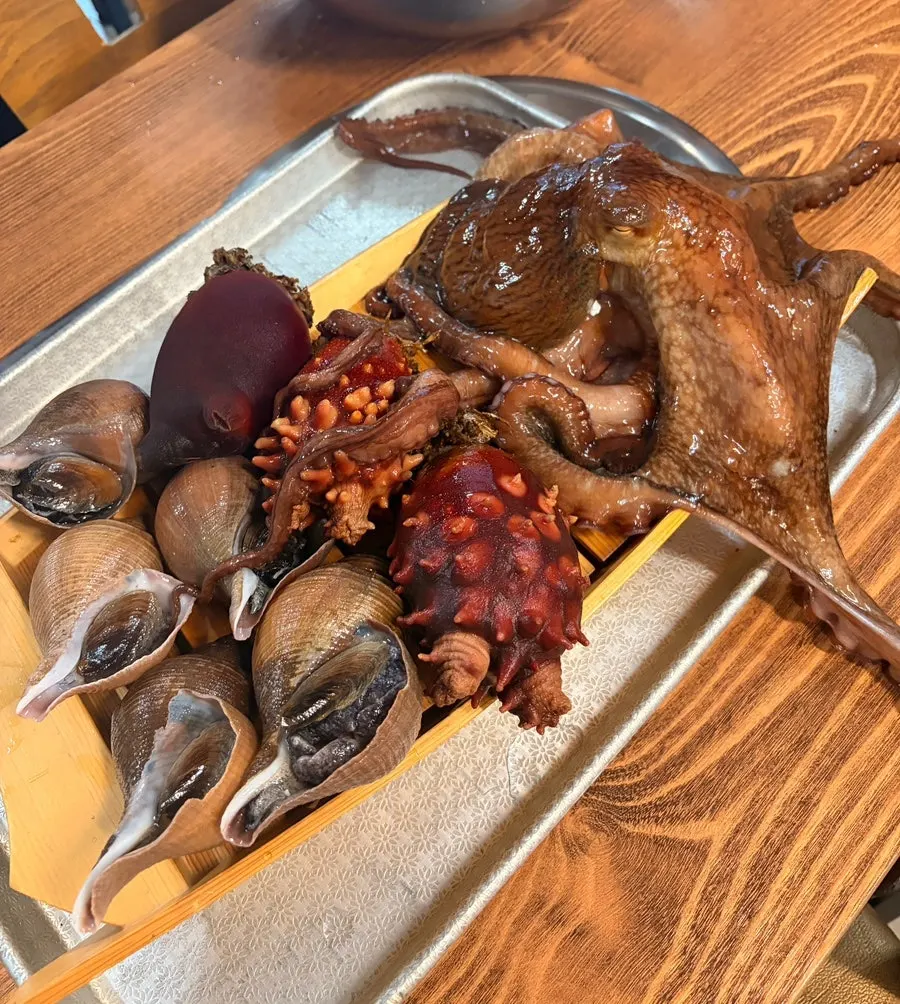 Live seafood ingredients pulled from the tank