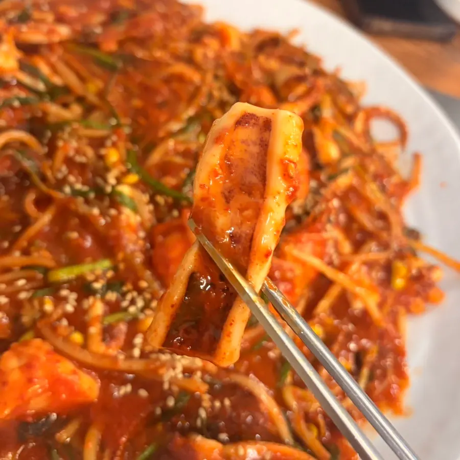 Octopus legs coated in spicy-sweet sauce