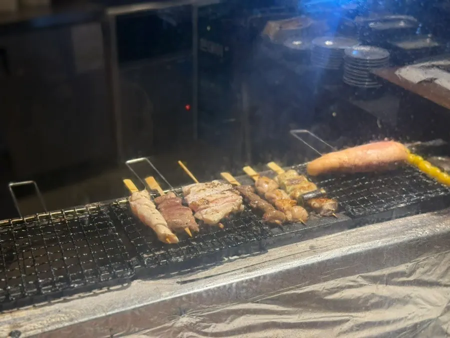Skewer ingredients before grilling