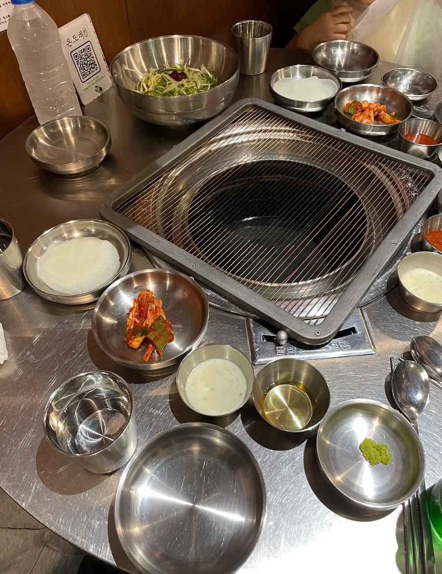 Table set with a charcoal grill