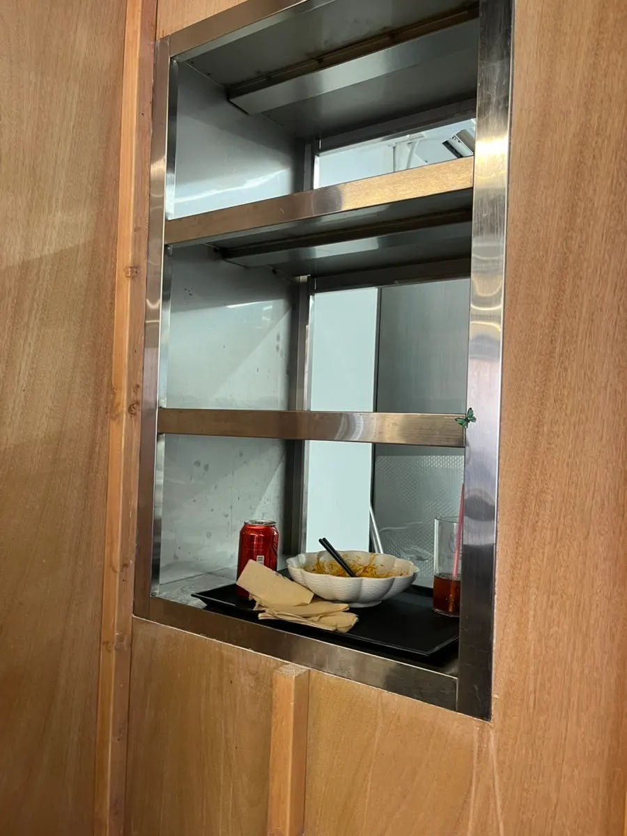 Showroom with desserts displayed next to the counter