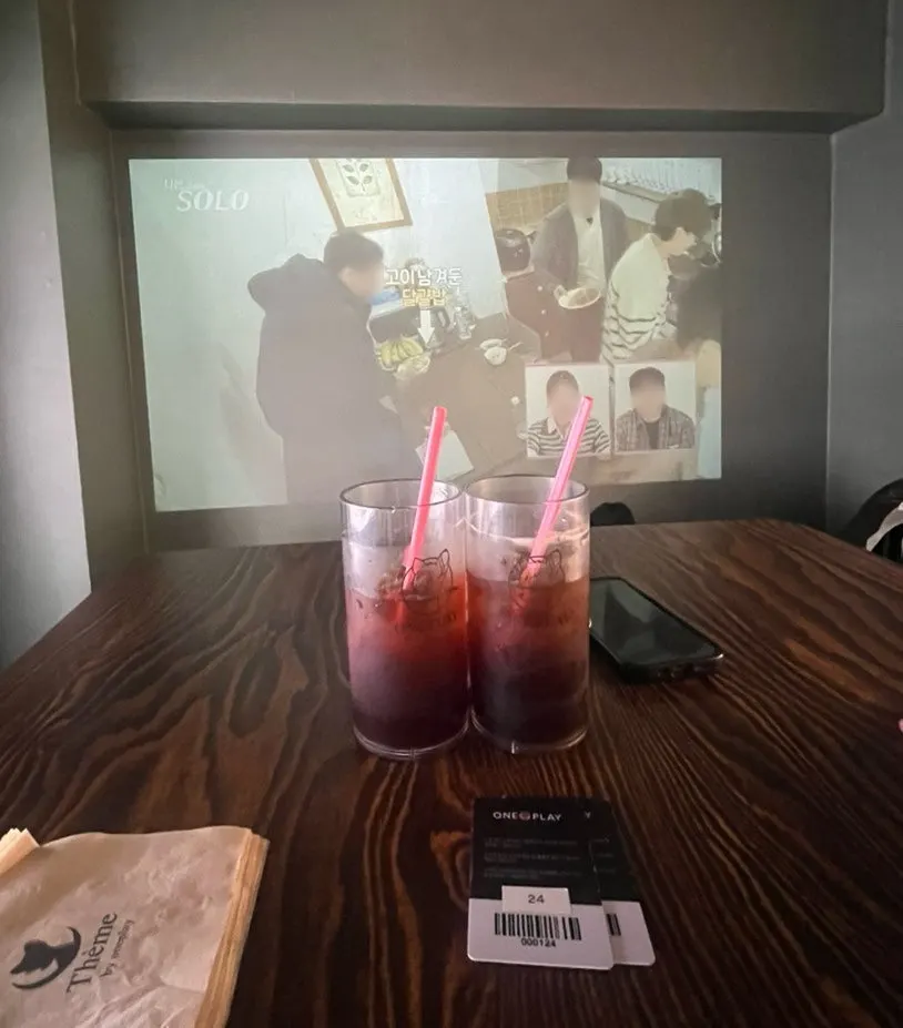 Inside an OTT room with a projector beaming onto the wall