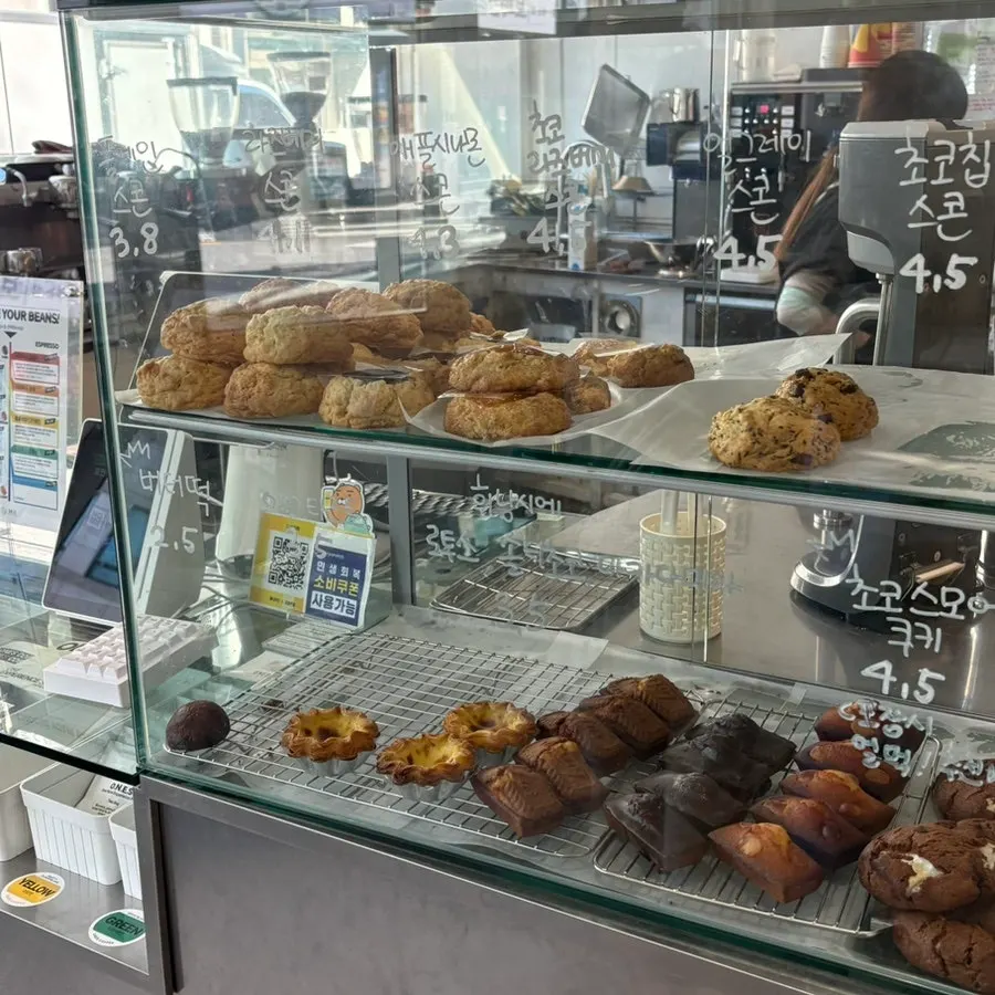 Menu board with takeout and tumbler discount information